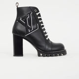 Black leather lace-up ankle boot with logo detailing, chunky block heel and lug sole — Louis Vuitton | Endless UAE