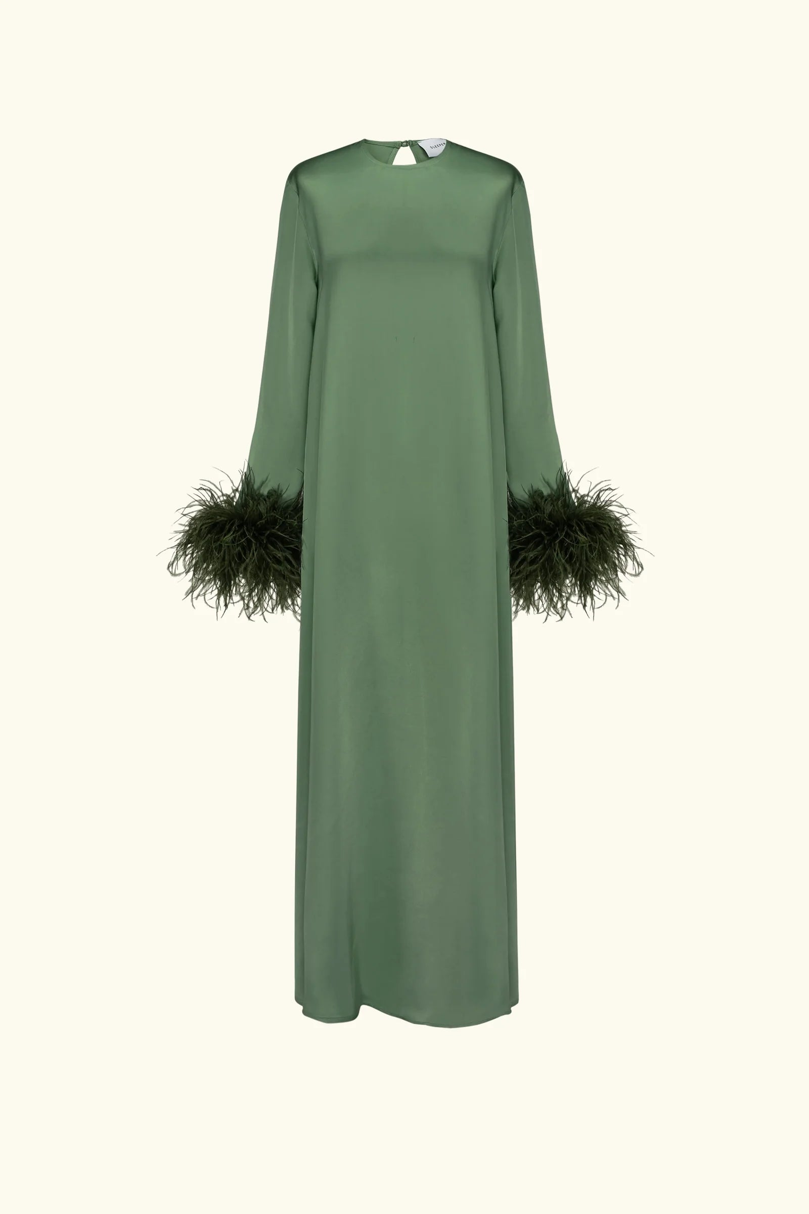 Woman wearing forest green satin midi dress with black feather cuffs and gold sandals — Sleeper | Endless UAE