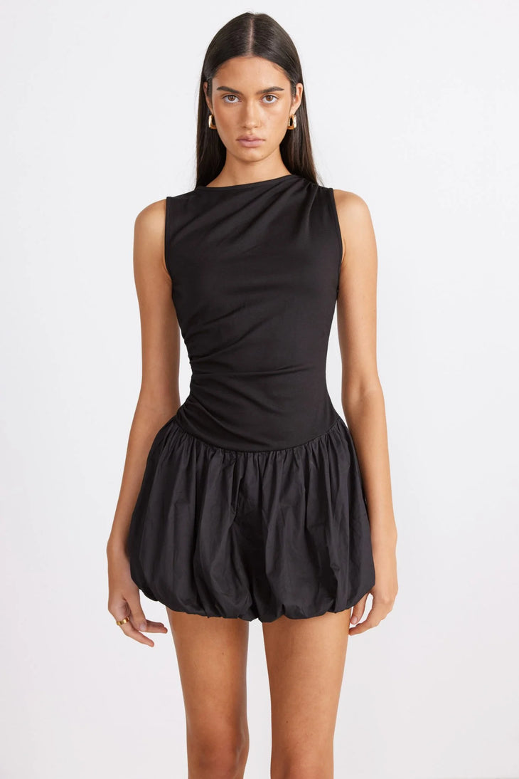 Black sleeveless bodycon mini dress with ruched detailing and bubble hem silhouette — SNDYS | Endless UAE