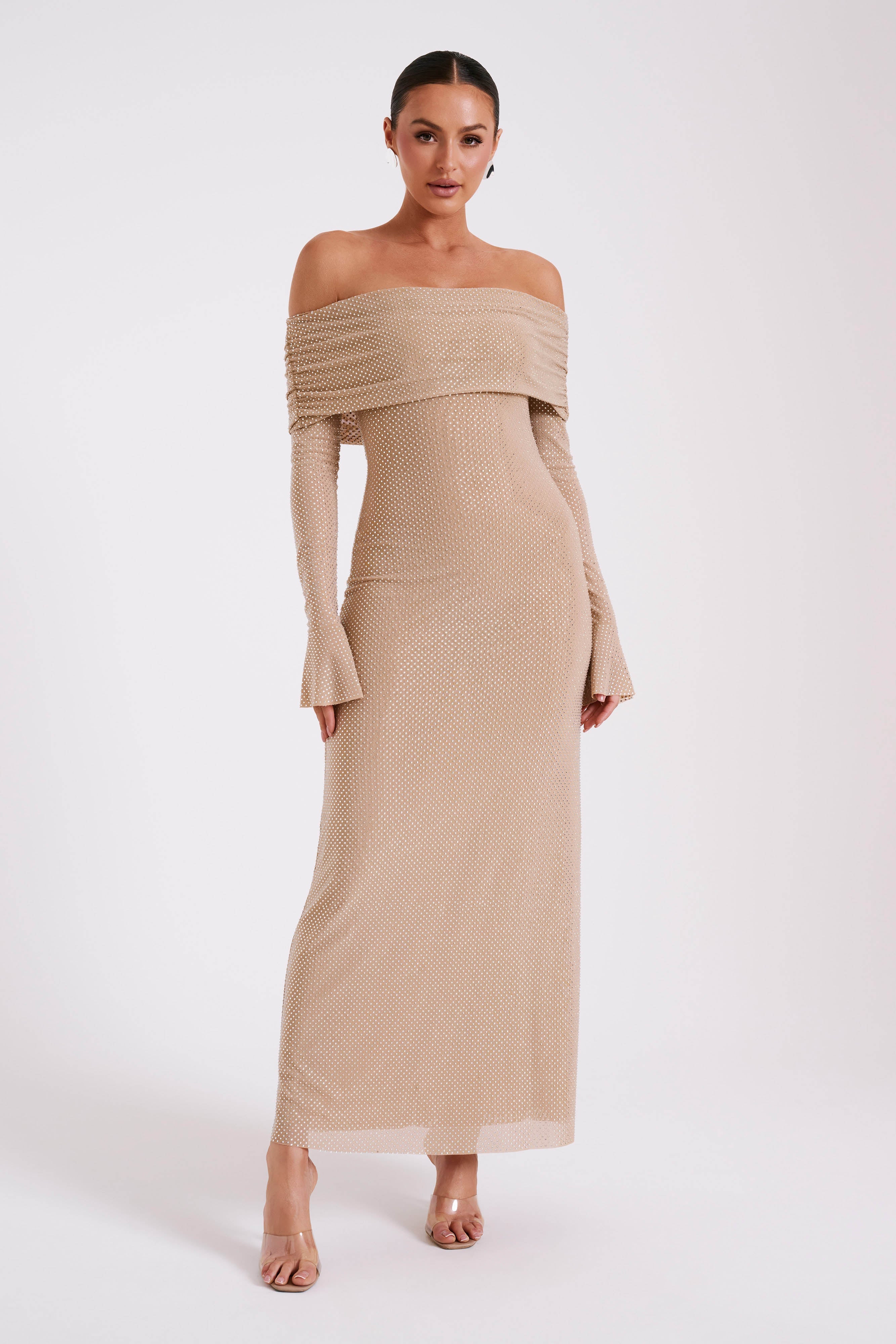 Woman wearing beige off-shoulder diamante maxi dress with long sleeves — Meshki | Endless UAE
