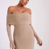 Woman wearing beige off-shoulder diamante maxi dress with long sleeves — Meshki | Endless UAE