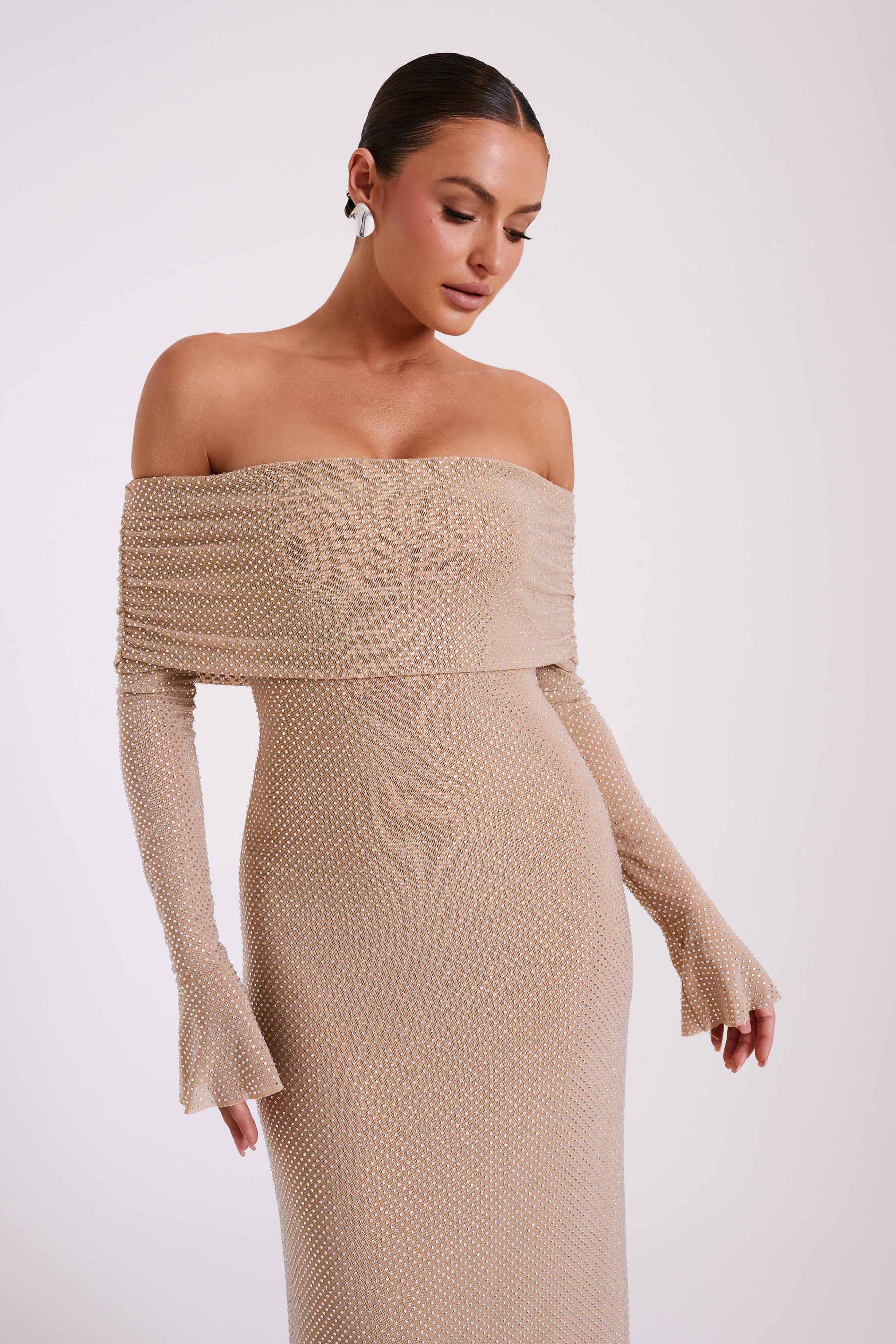 Woman wearing beige off-shoulder diamante maxi dress with long sleeves — Meshki | Endless UAE