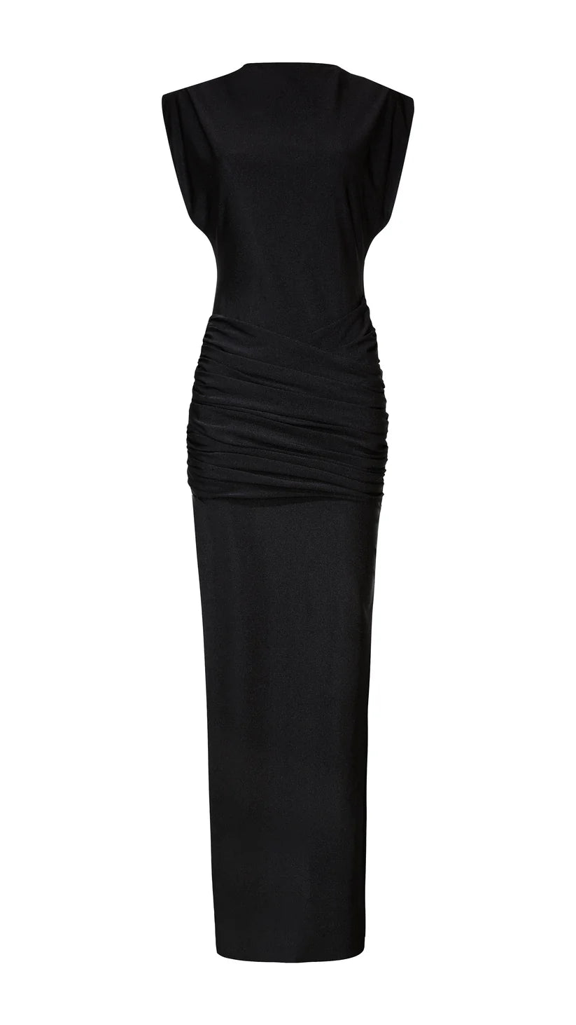 Woman wearing black sleeveless maxi dress with ruched side detail and gold bangles — Lediel | Endless UAE