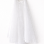 Elegant white lace wedding dress with long sleeves and flowing tulle train — Tatiana Kaplun | Endless UAE