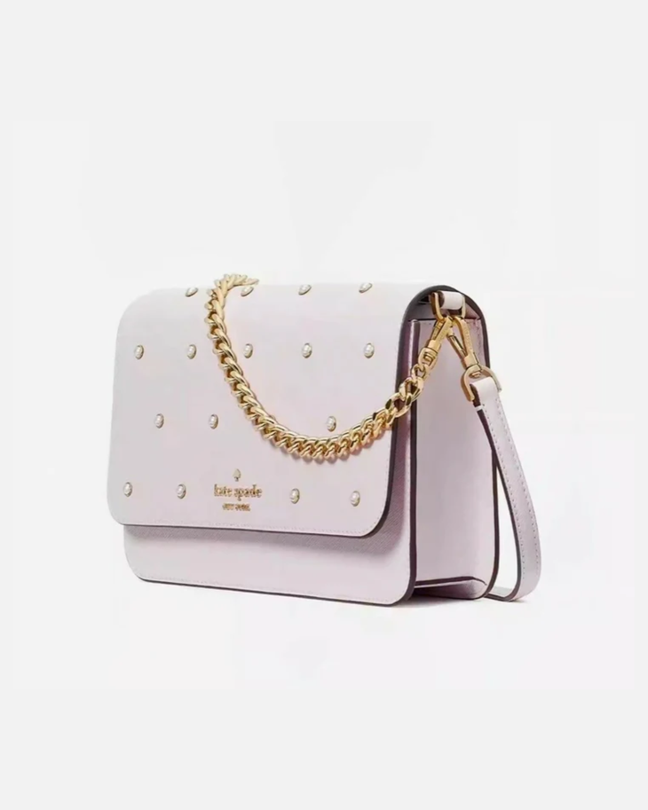 Pale pink leather crossbody bag with stud details and gold chain strap — Kate Spade | Endless UAE