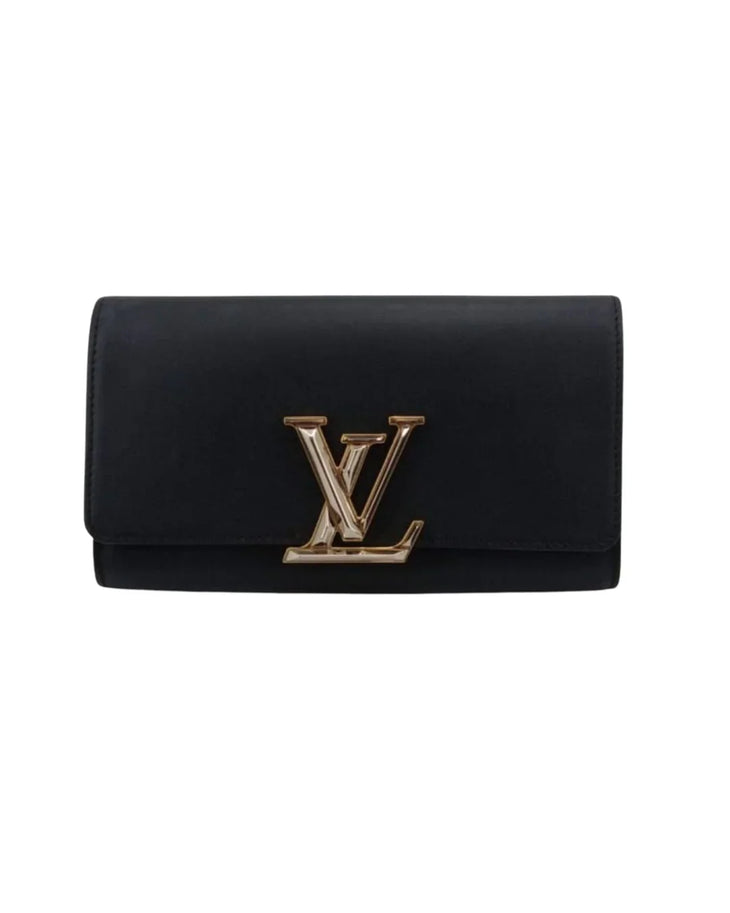 Black satin clutch with metallic LV logo closure and fold-over flap design — Louis Vuitton | Endless UAE
