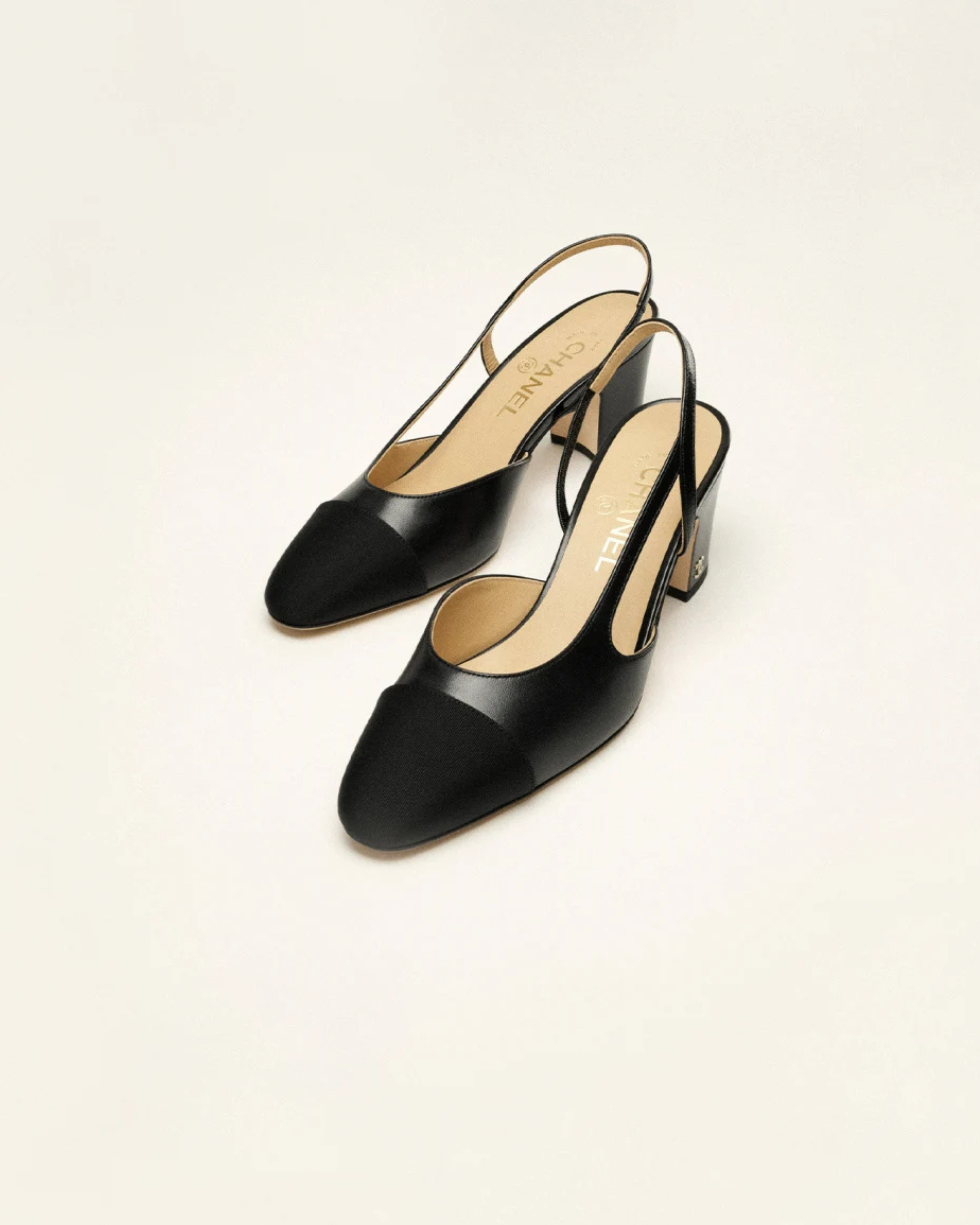 Black slingback heels in goatskin and grosgrain with CC logo — Chanel | Endless UAE