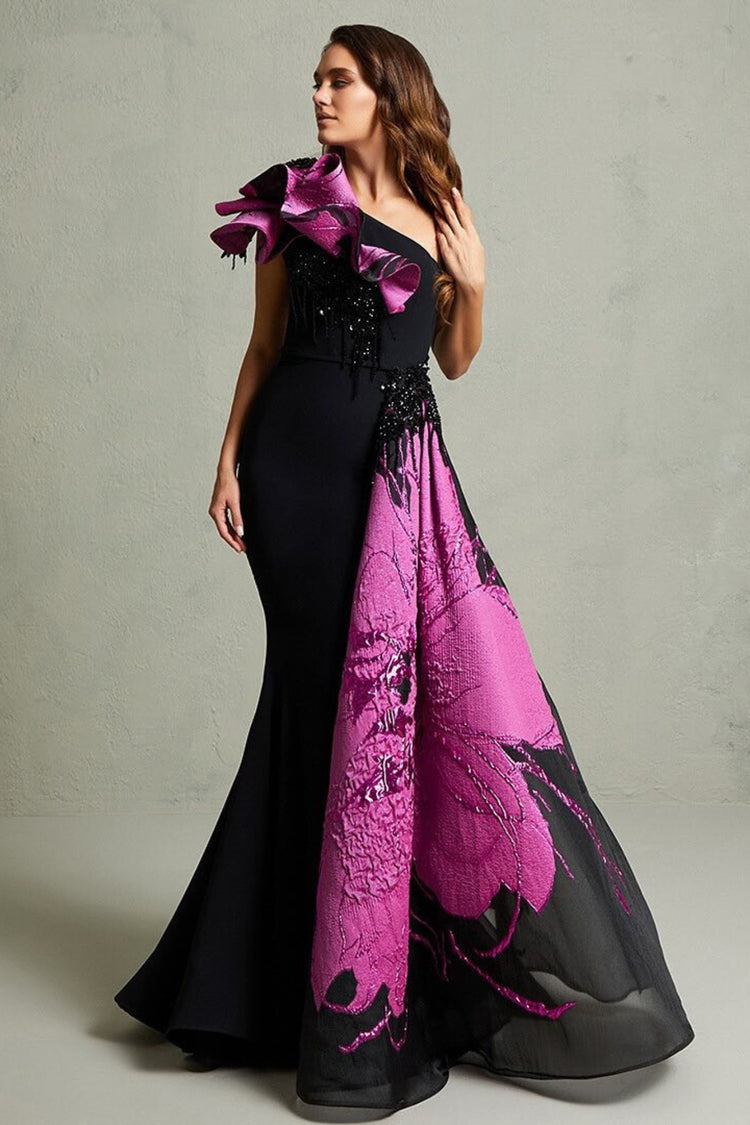 Black mermaid gown with magenta floral train and ruffled shoulder detail — In Couture | Endless UAE
