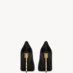Black patent leather pointed-toe pumps with gold-tone YSL logo heel detail — Yves Saint Laurent | Endless UAE