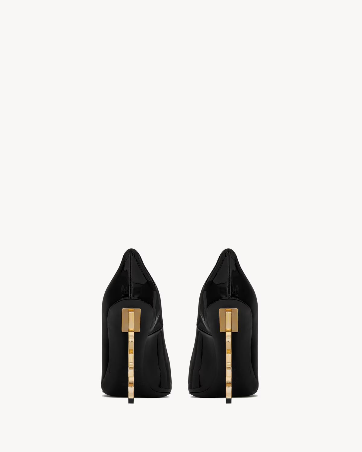 Black patent leather pointed-toe pumps with gold-tone YSL logo heel detail — Yves Saint Laurent | Endless UAE