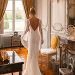 Embellished mermaid wedding dress with flowing cape and plunging neckline — Katy Corso Glen | Endless UAE