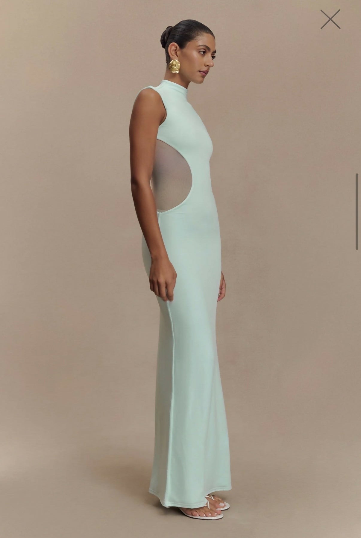 Mint green sleeveless maxi dress with mesh side cutouts and high neckline — Endless | Endless UAE