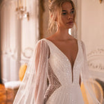 Embellished mermaid wedding dress with flowing cape and plunging neckline — Katy Corso Glen | Endless UAE