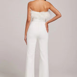 Colette White Jumpsuit with feathered neckline and wide-leg silhouette — Nadine Merabi | Endless UAE