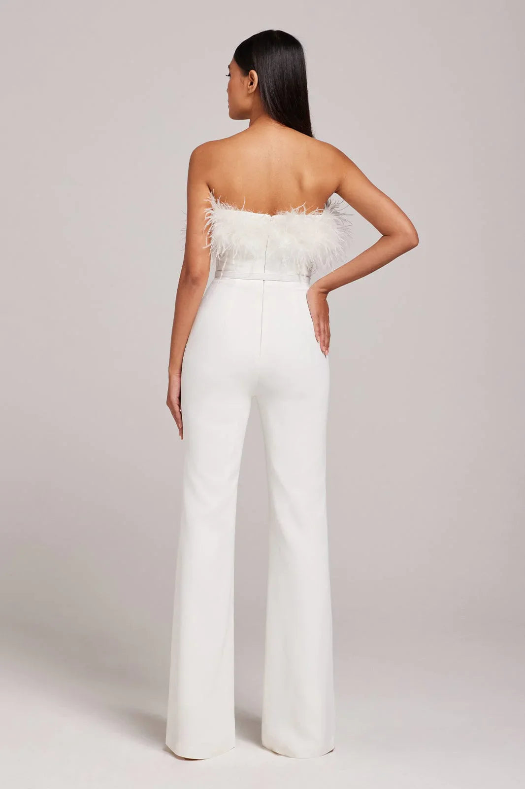 Colette White Jumpsuit with feathered neckline and wide-leg silhouette — Nadine Merabi | Endless UAE