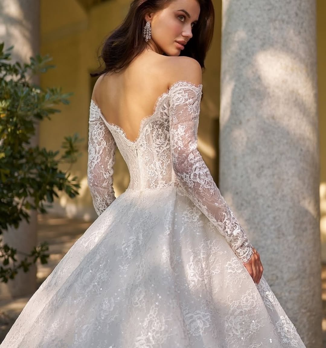 Elegant off-shoulder ball gown wedding dress with long lace sleeves and V-back — Sima Couture | Endless UAE