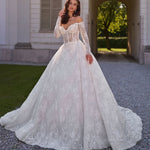 Elegant off-shoulder lace ball gown wedding dress with long sleeves and cathedral train in ivory white — Sima Couture | Endless UAE