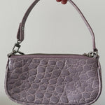 Mini Rachel Lilac Croco Embossed Leather Bag held in hand against white background — By Far | Endless UAE