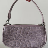 Mini Rachel Lilac Croco Embossed Leather Bag held in hand against white background — By Far | Endless UAE