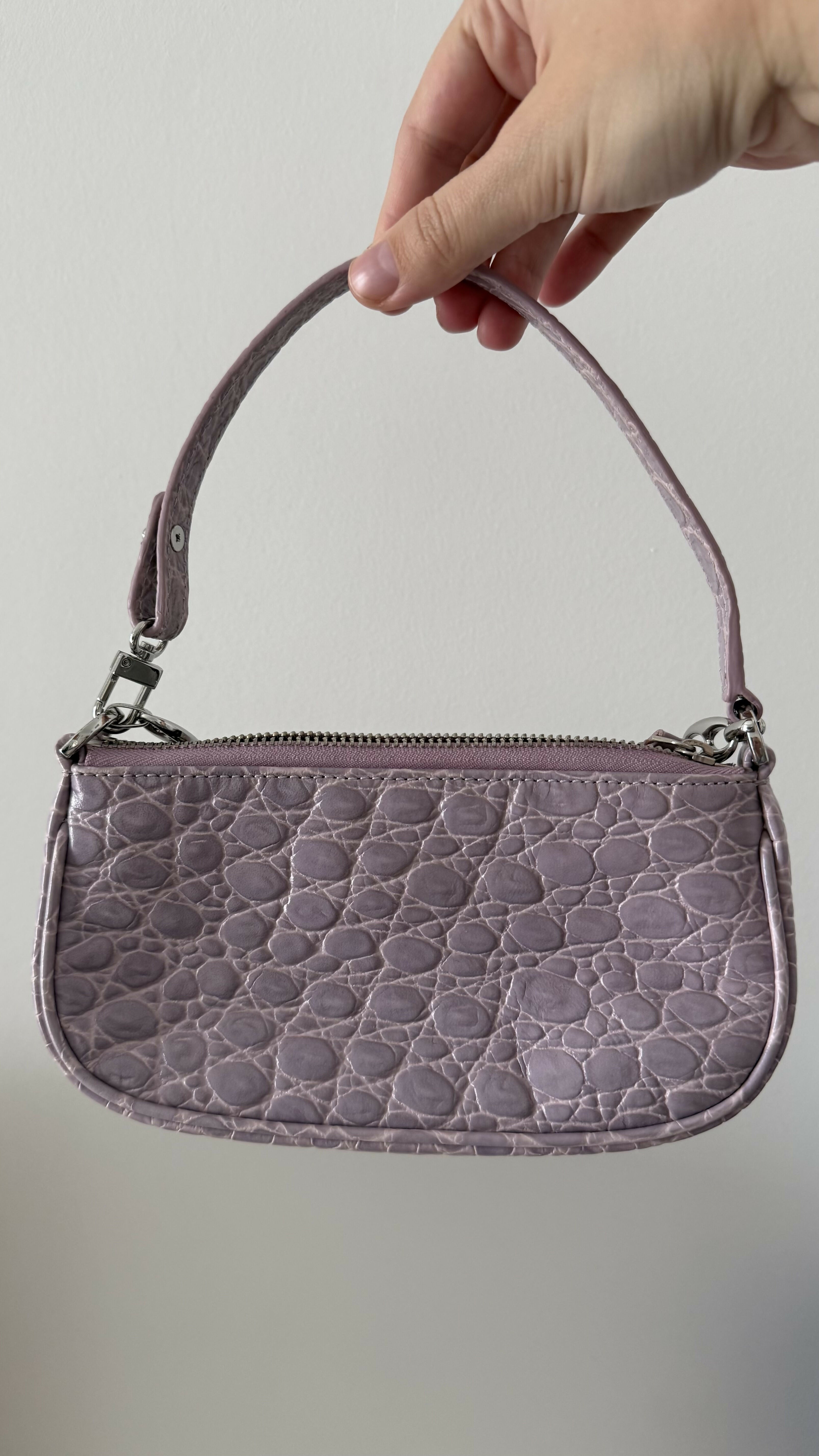 Mini Rachel Lilac Croco Embossed Leather Bag held in hand against white background — By Far | Endless UAE
