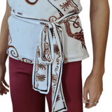 One shoulder white top with brown ornate print and black trim details — Ancient Kallos | Endless UAE