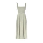 Woman wearing sage green square neck midi dress with full skirt and pockets — Odd Muse | Endless UAE