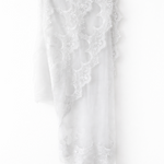 Elegant white lace wedding dress with long sleeves and flowing tulle train — Tatiana Kaplun | Endless UAE