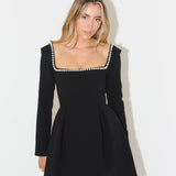 Black mini dress with pearl-trimmed square neckline and long sleeves — Odd Muse | Endless UAE