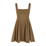 Woman wearing tan square neck mini dress with white strappy heels — Odd Muse | Endless UAE