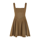 Woman wearing tan square neck mini dress with white strappy heels — Odd Muse | Endless UAE