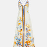Woman wearing a floral printed white linen midi dress with blue and yellow trim — Zimmerman | Endless UAE