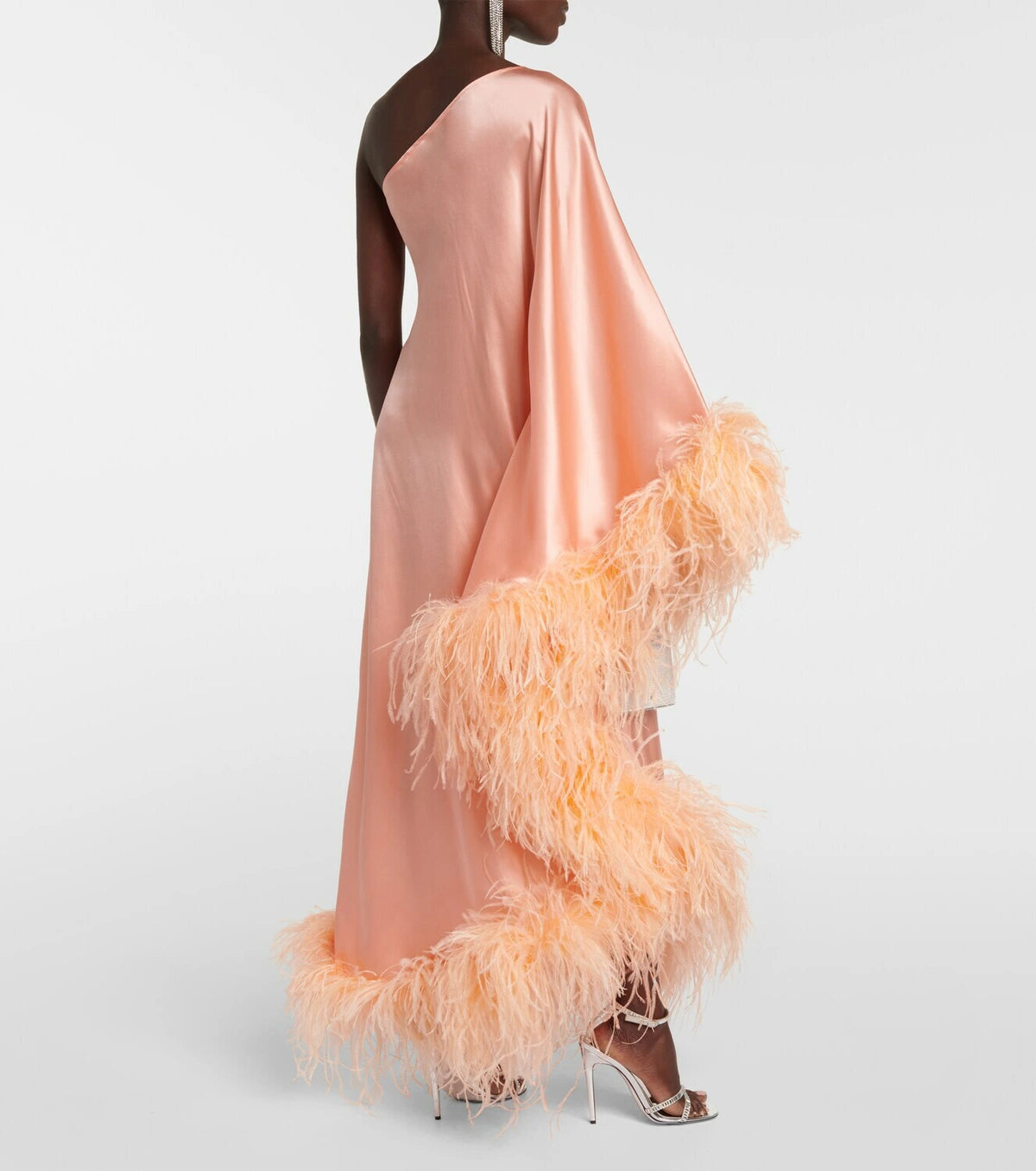 Peach silk one-shoulder maxi dress with feather trim and silver clutch — Taller Marmo | Endless UAE