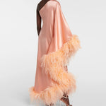Peach silk one-shoulder maxi dress with feather trim and silver clutch — Taller Marmo | Endless UAE