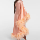 Peach silk one-shoulder maxi dress with feather trim and silver clutch — Taller Marmo | Endless UAE