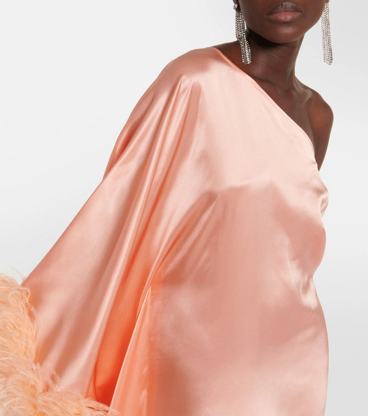 Peach silk one-shoulder maxi dress with feather trim and silver clutch — Taller Marmo | Endless UAE