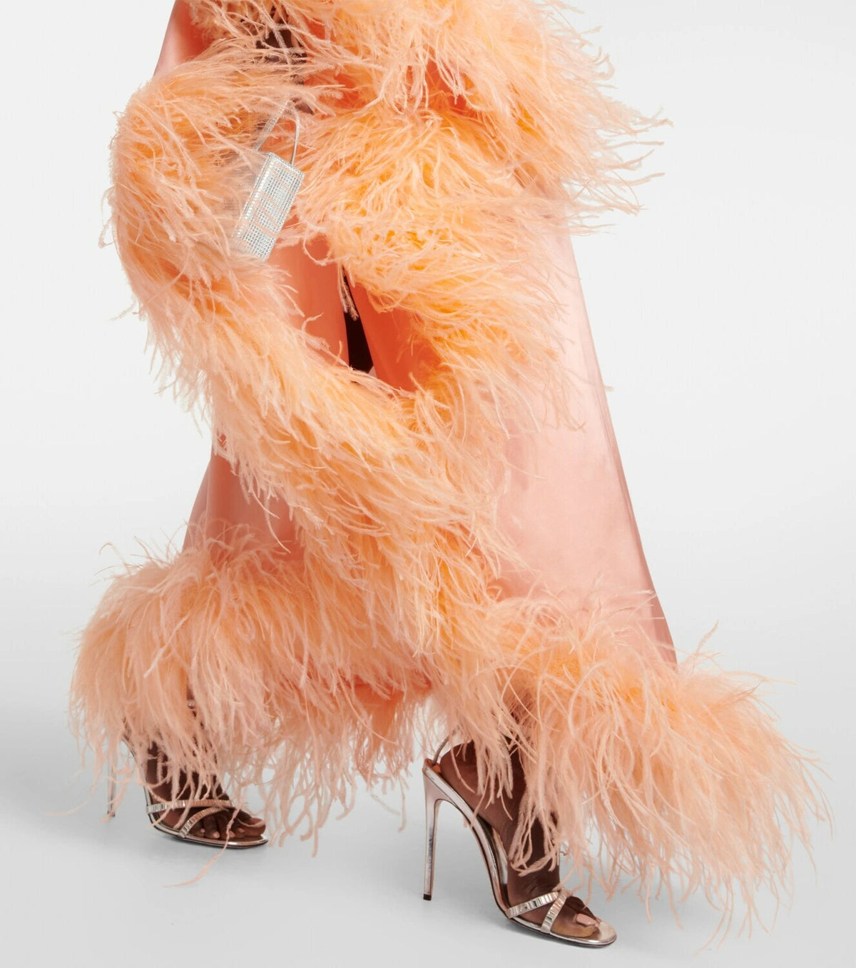 Peach silk one-shoulder maxi dress with feather trim and silver clutch — Taller Marmo | Endless UAE