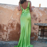Lime green Scoop Dress with open back detail worn by model against textured wall — By Keara | Endless UAE