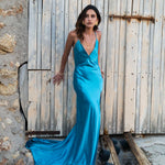 Elegant turquoise backless maxi dress with draped train and plunging neckline — By Keara | Endless UAE