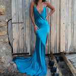 Elegant turquoise backless maxi dress with deep V-neck, thin straps, and high slit — By Keara | Endless UAE
