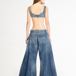 Wide-leg balloon ripped jeans with distressed knee detail in medium blue wash — Mrs. Keepa | Endless UAE