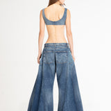 Wide-leg balloon ripped jeans with distressed knee detail in medium blue wash — Mrs. Keepa | Endless UAE