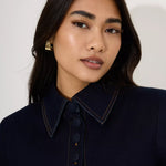 Woman wearing navy cotton denim collared midi dress with short sleeves — Endless | Endless UAE
