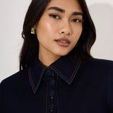 Woman wearing navy cotton denim collared midi dress with short sleeves — Endless | Endless UAE