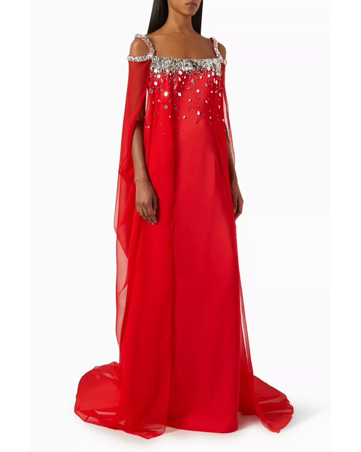Red embellished cold-shoulder gown with crystal details and flowing cape — Anatomi | Endless UAE