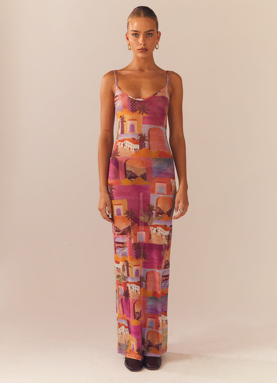 Dreams Of The Desert Dress in vibrant orange and pink tones with architectural patterns — Peppermayo | Endless UAE