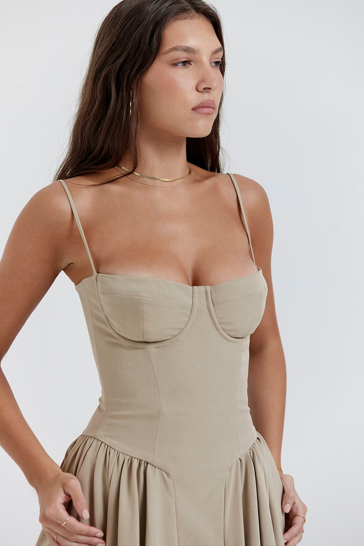 Beige corset sundress with structured bodice and pleated midi skirt — House of CB | Endless UAE