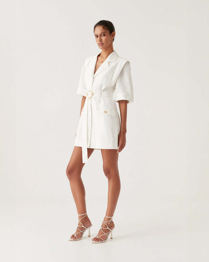 Lyric Belted Mini Dress in white linen with short sleeves and gold buckle belt — Aje | Endless UAE
