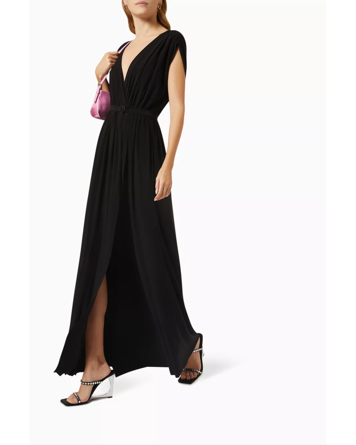 Woman wearing black Athena Maxi Dress with wrap front and cap sleeves — Norma Kamali | Endless UAE