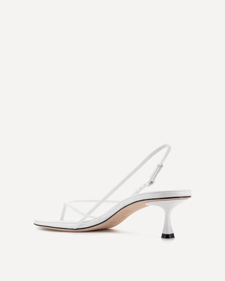 White leather slingback heel with curved wishbone design and sculpted kitten heel — Studio Amelia | Endless UAE
