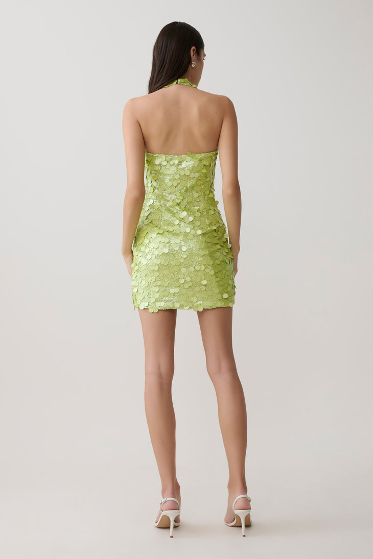 Woman wearing lime green sequin halter mini dress with scalloped neckline — Meshki | Endless UAE